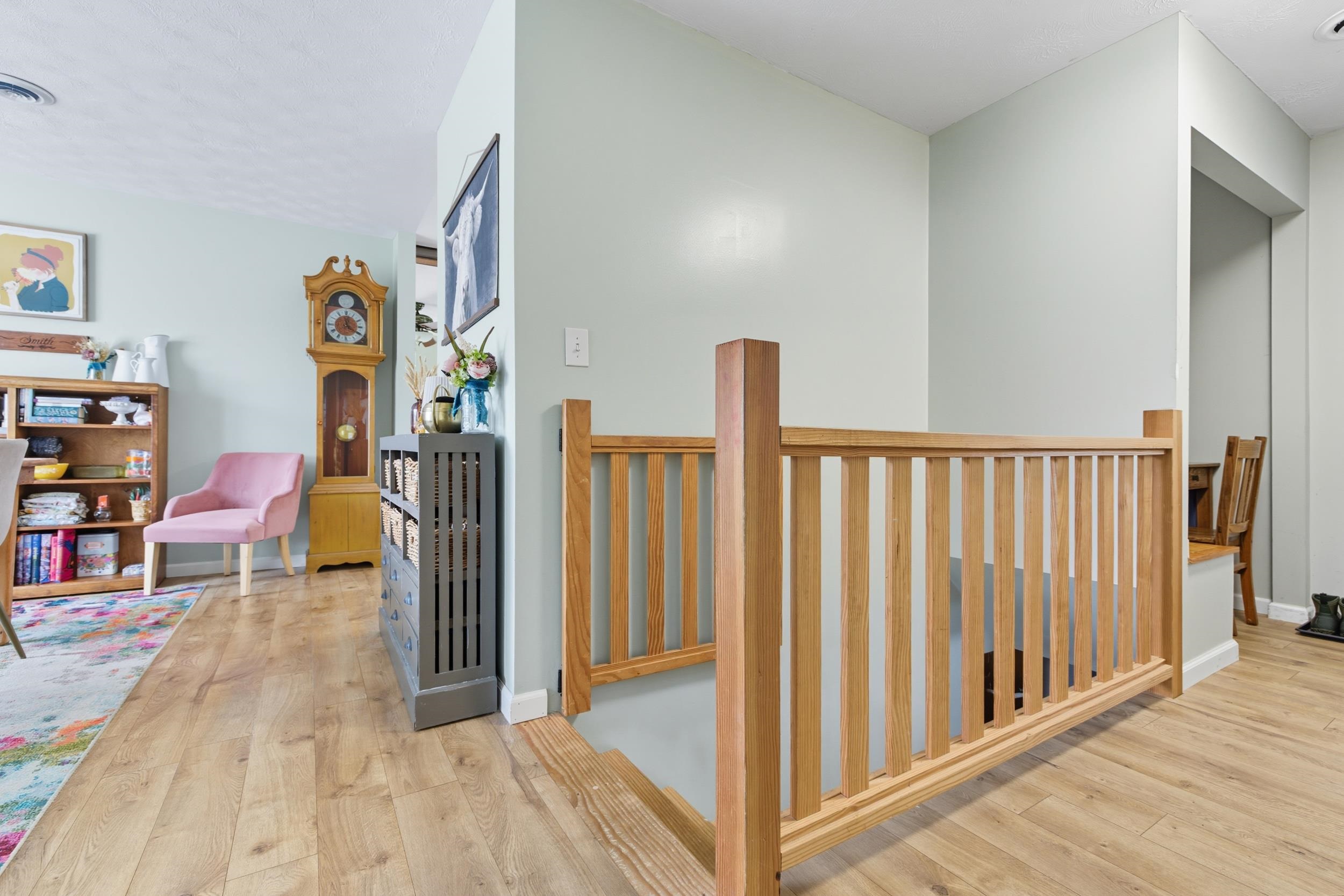 8449 Indian Trail Road Harrisonburg, VA 22802 - Photo 24 of 75 a view of a livingroom with wooden floor and stairs