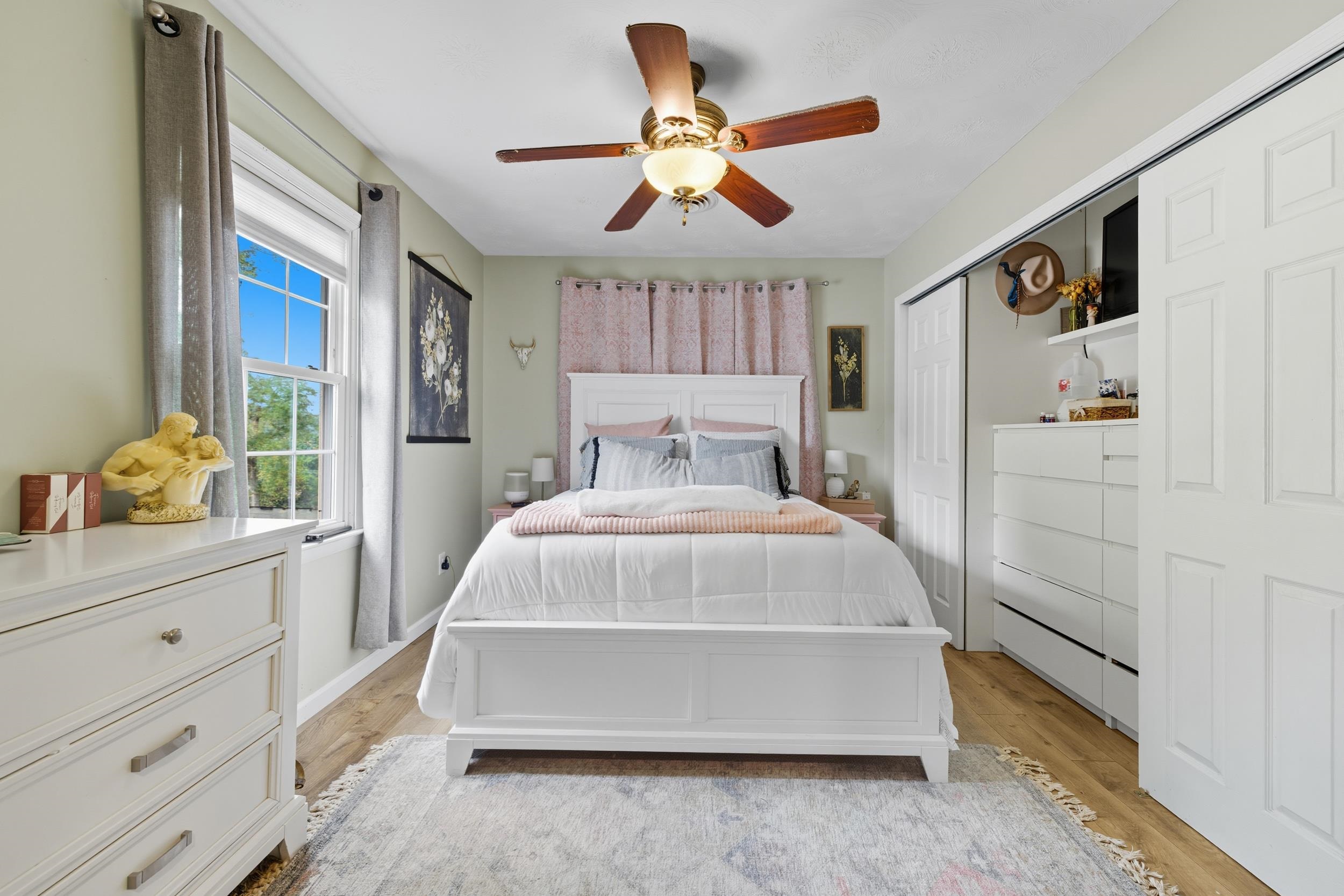 8449 Indian Trail Road Harrisonburg, VA 22802 - Photo 26 of 75 a spacious bedroom with a bed and a window