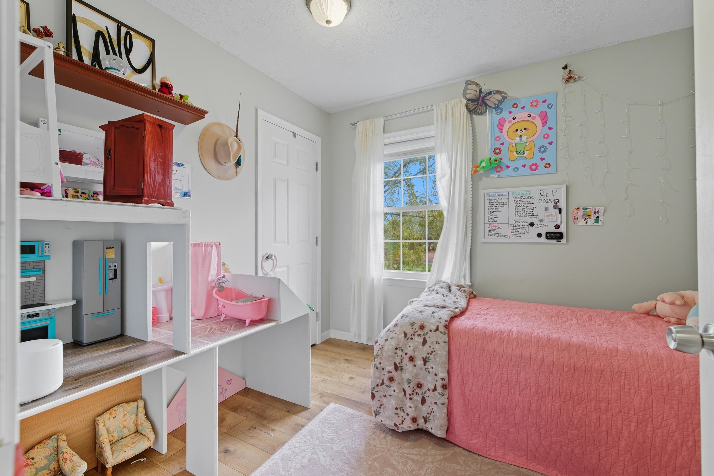 8449 Indian Trail Road Harrisonburg, VA 22802 - Photo 34 of 75 a bedroom with a bed and window