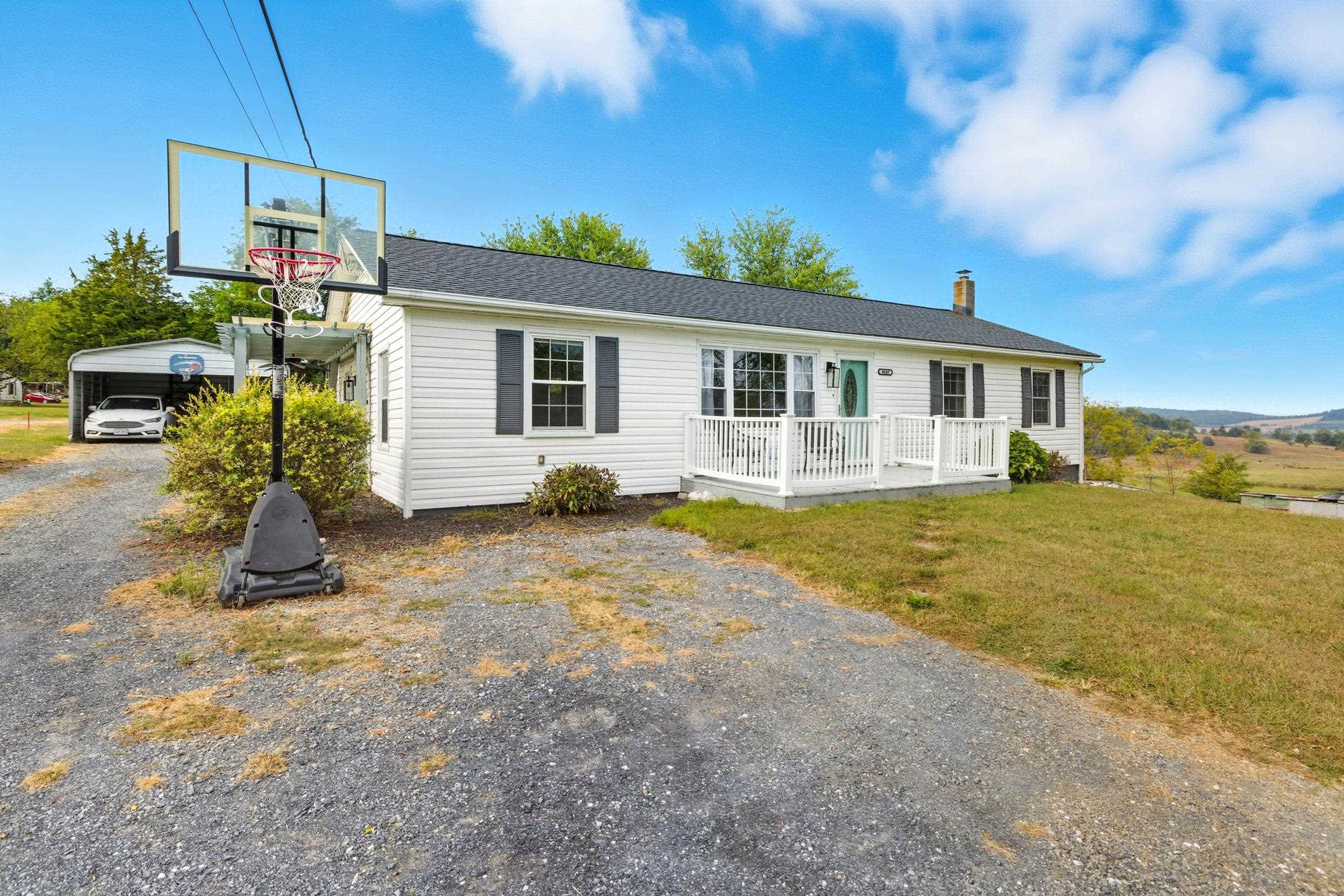 8449 Indian Trail Road Harrisonburg, VA 22802 - Photo 48 of 75 a view of a house with a patio