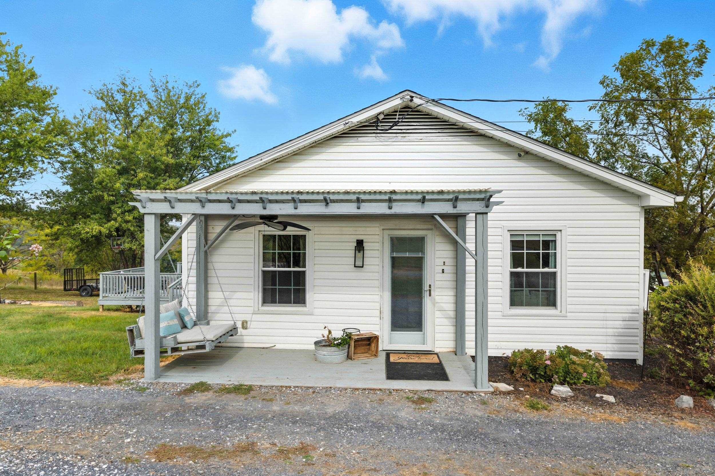 8449 Indian Trail Road Harrisonburg, VA 22802 - Photo 52 of 75 a front view of a house with garden