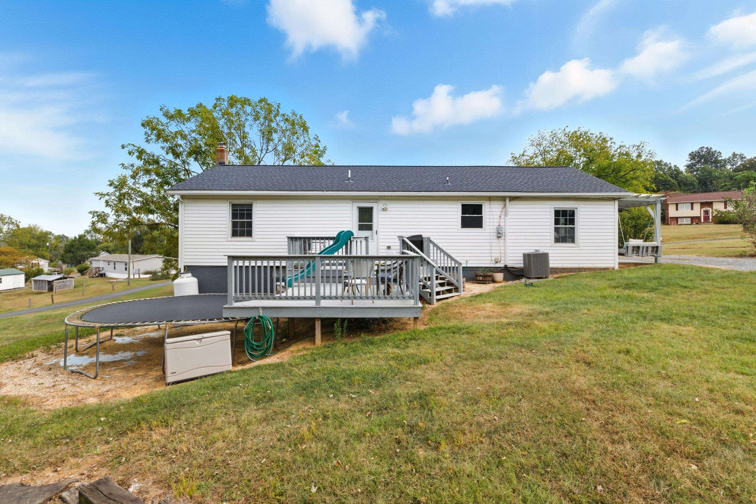 8449 Indian Trail Road Harrisonburg, VA 22802 - Photo 54 of 75 a view of a house with pool and chairs
