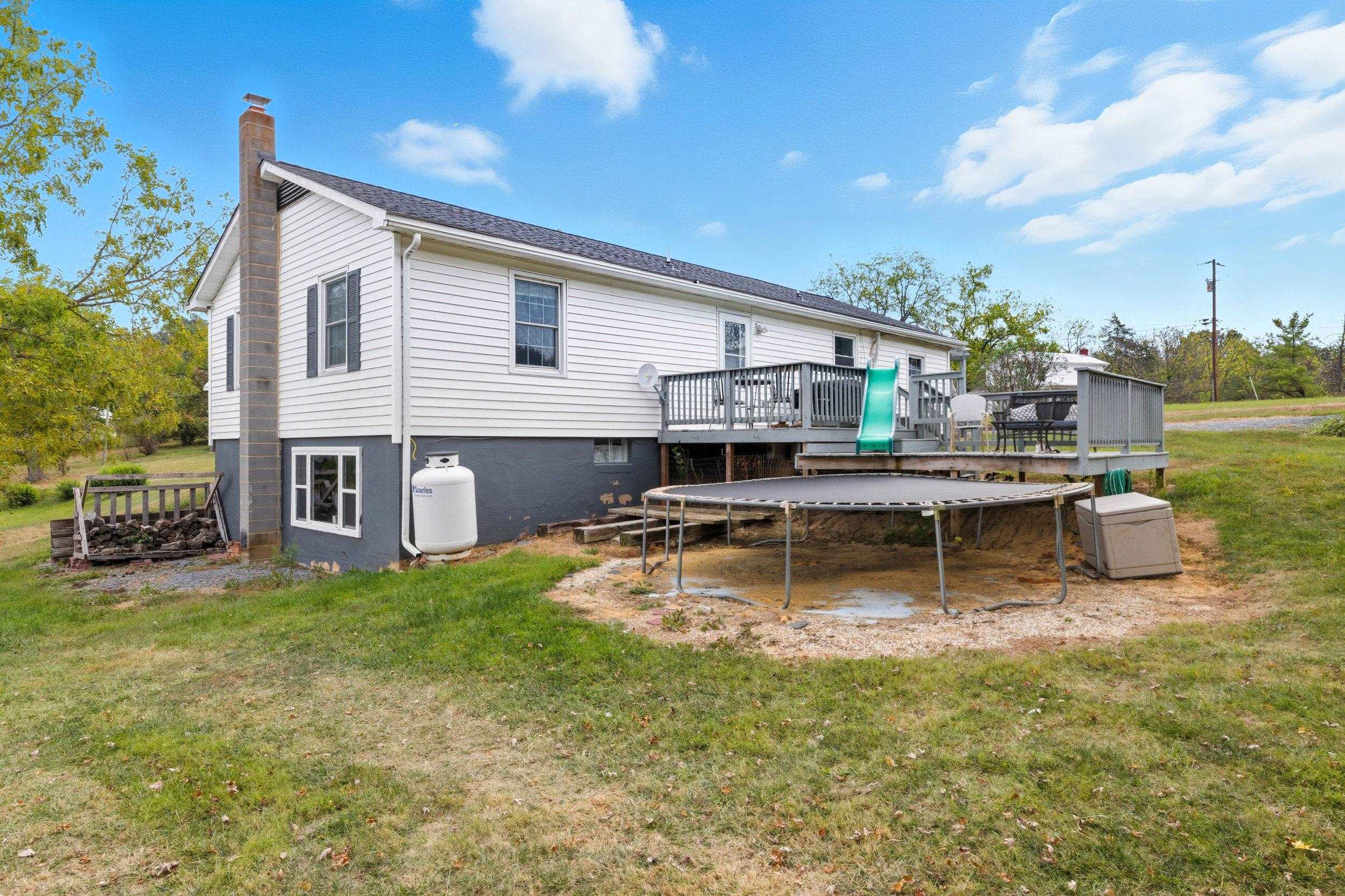 8449 Indian Trail Road Harrisonburg, VA 22802 - Photo 56 of 75 a view of a house with pool and chairs