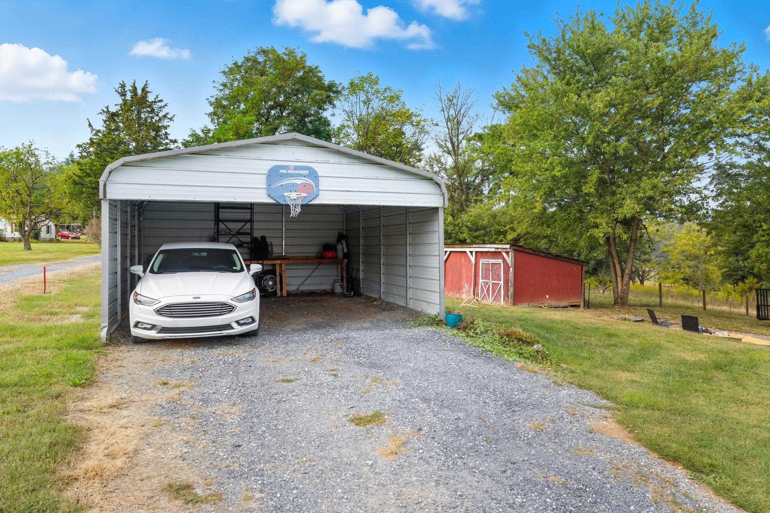8449 Indian Trail Road Harrisonburg, VA 22802 - Photo 62 of 75 a car parked in front of a house