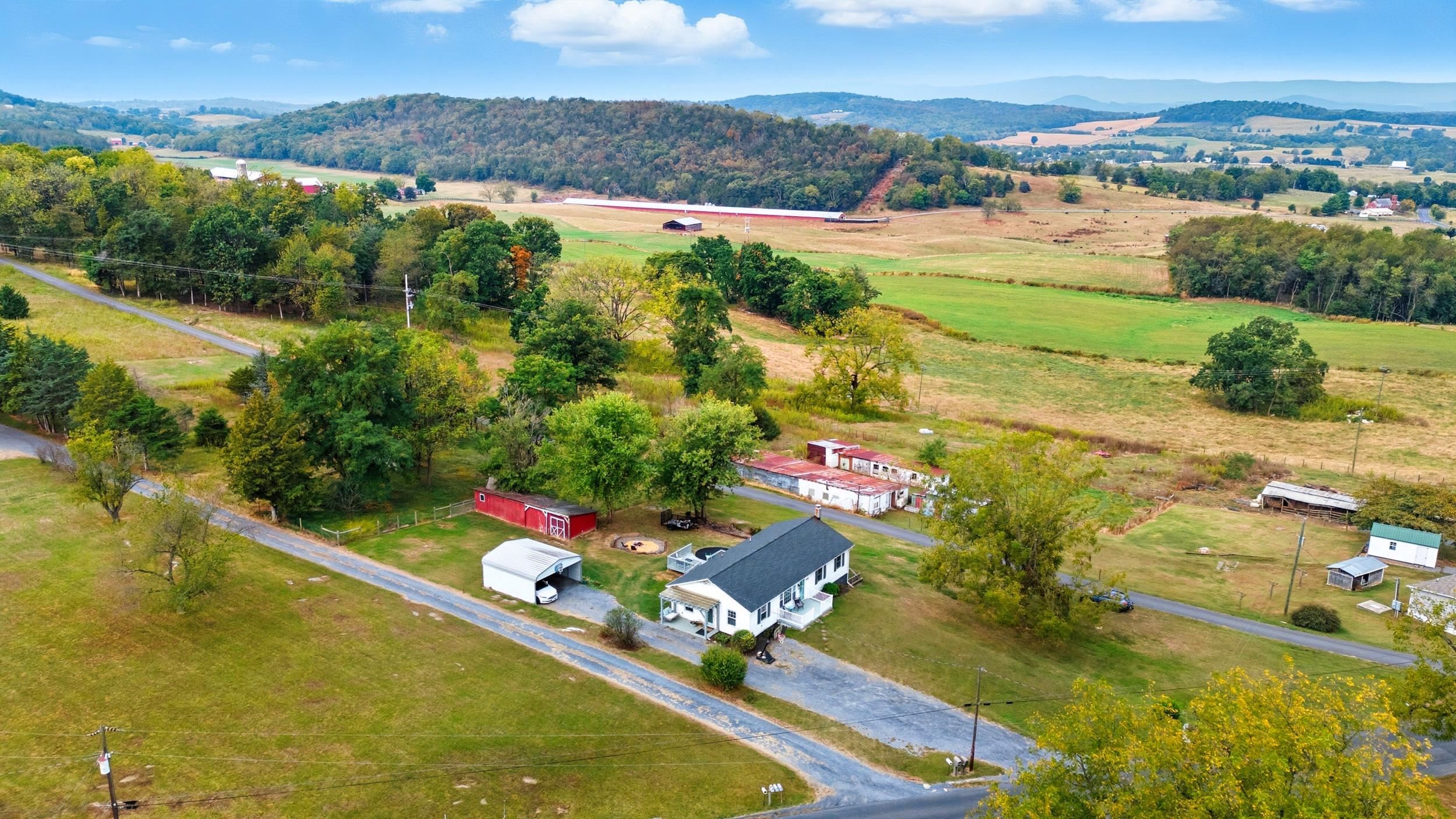 8449 Indian Trail Road Harrisonburg, VA 22802 - Photo 71 of 75 an aerial view of lake residential houses with outdoor space and swimming pool
