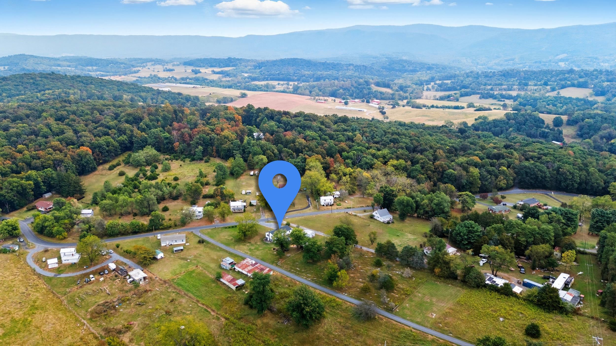 8449 Indian Trail Road Harrisonburg, VA 22802 - Photo 74 of 75 an aerial view of a city and mountain view in back