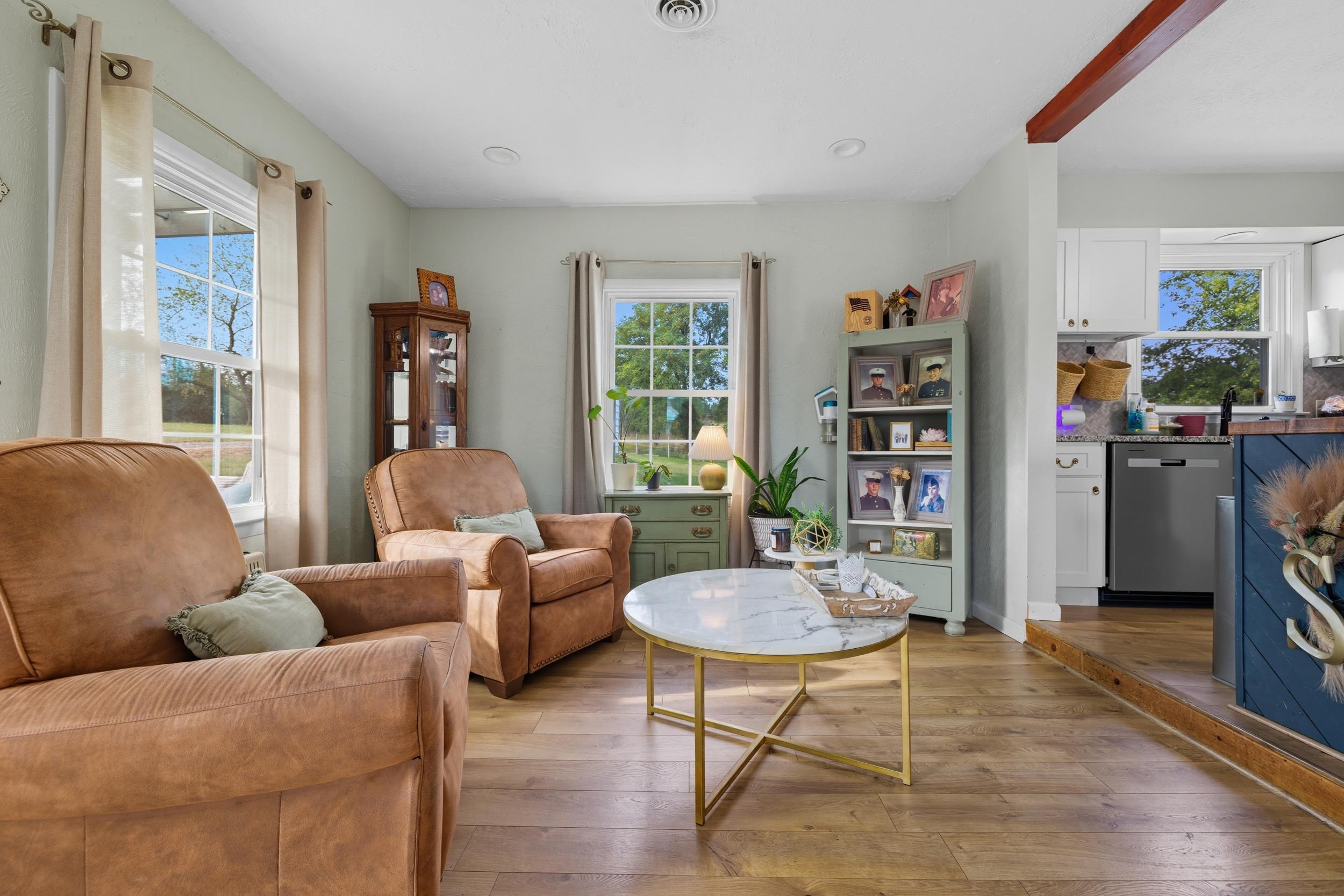 8449 Indian Trail Road Harrisonburg, VA 22802 - Photo 10 of 75 a living room with furniture and a book shelf