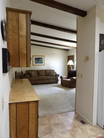 a en suite bathroom with a sink and a mirror
