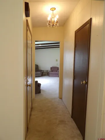 a view of a hallway to a room