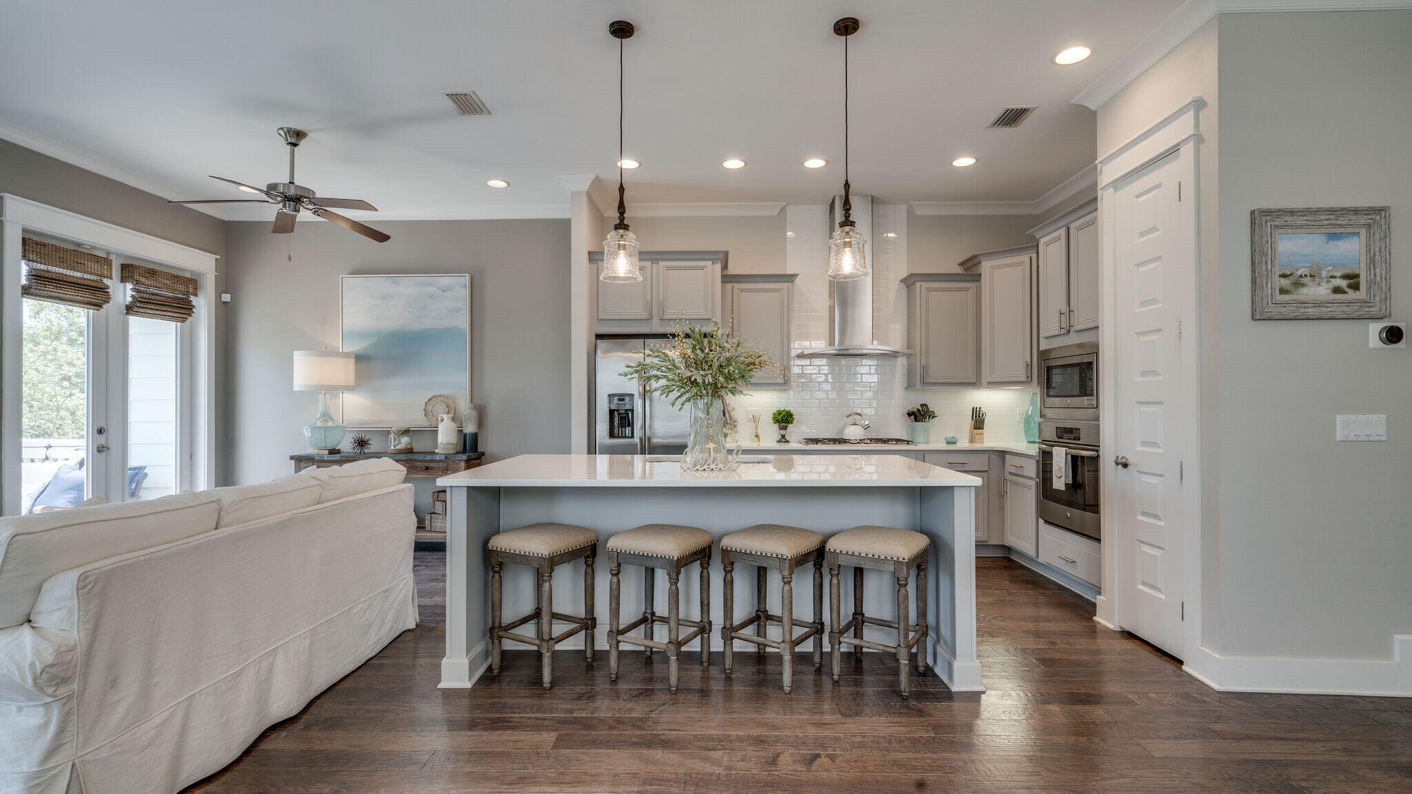23 Milestone Dr Inlet Beach, Unit A Inlet Beach, FL 32461 - Photo 2 of 34 a large kitchen with a table and chairs in it