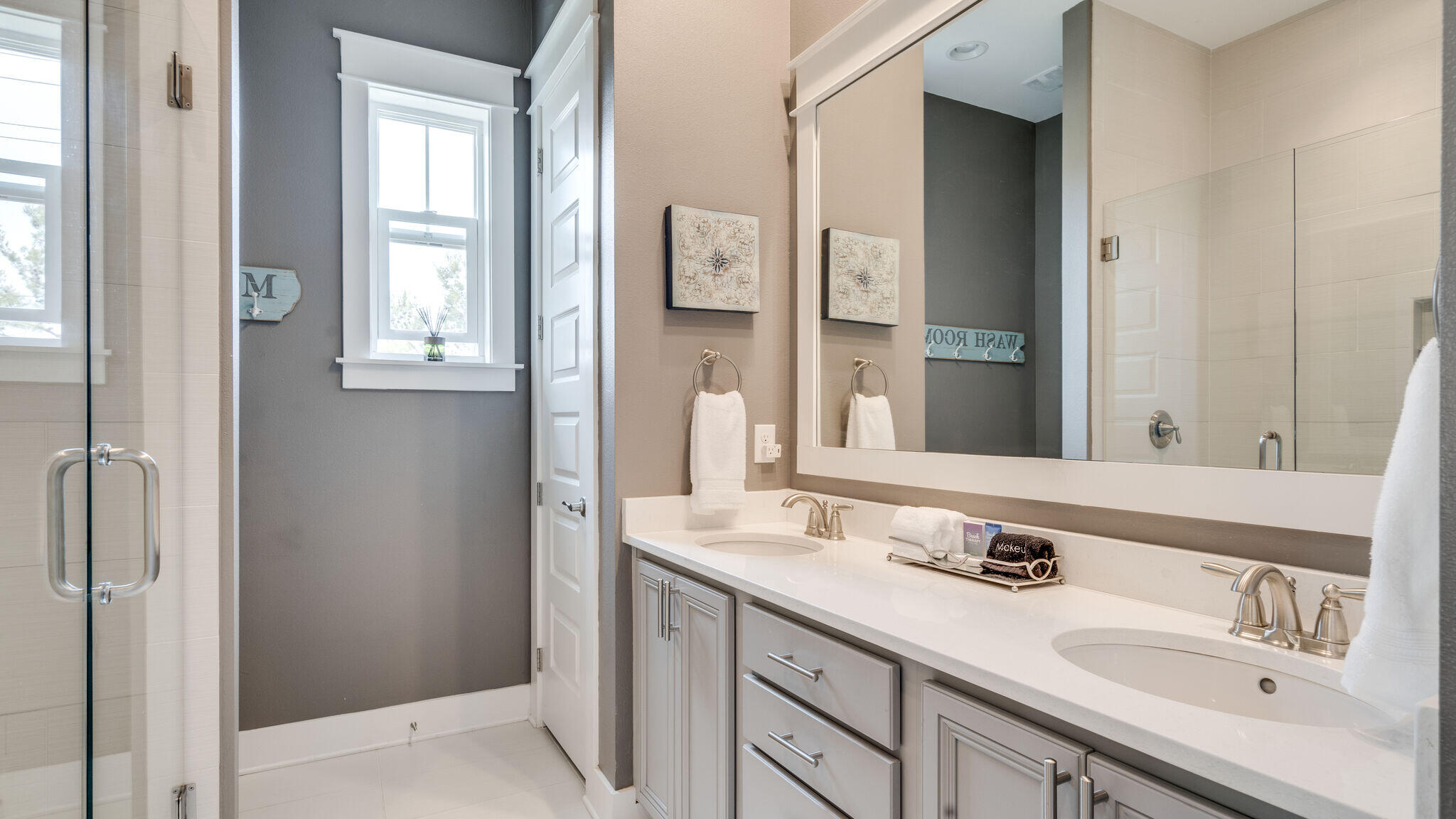 23 Milestone Dr Inlet Beach, Unit A Inlet Beach, FL 32461 - Photo 21 of 34 a bathroom with a sink and a mirror