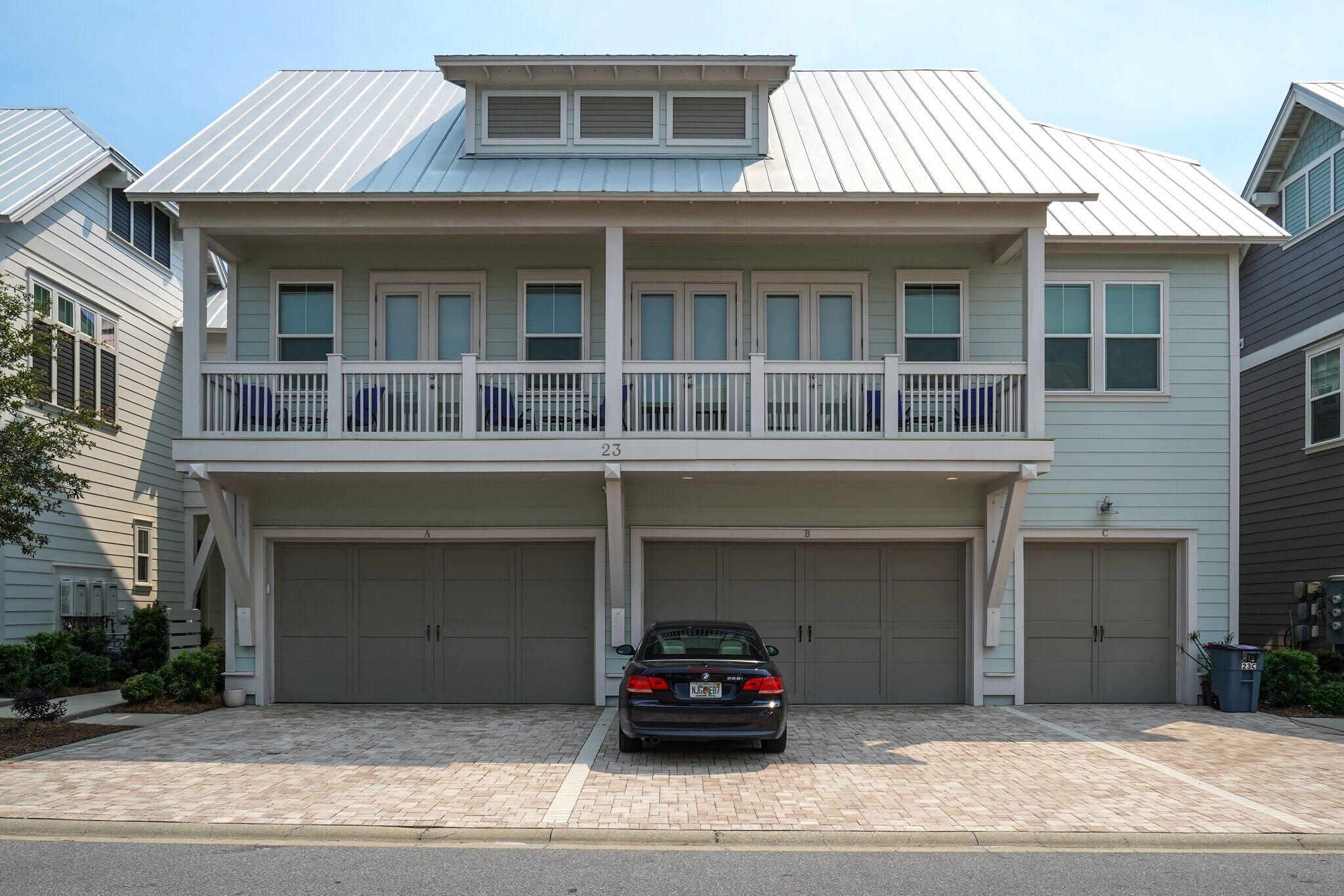 23 Milestone Dr Inlet Beach, Unit A Inlet Beach, FL 32461 - Photo 26 of 34 a front view of a house with a garage