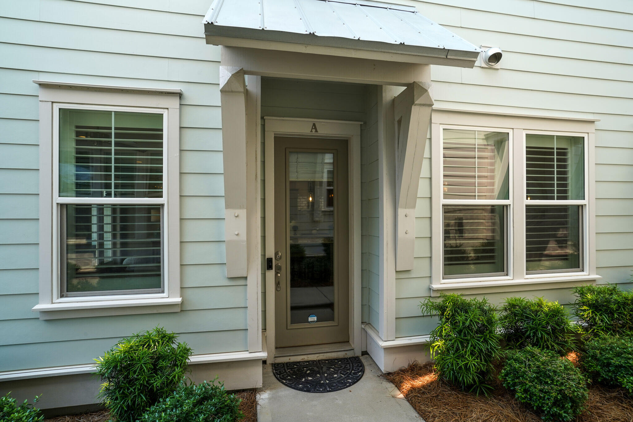 23 Milestone Dr Inlet Beach, Unit A Inlet Beach, FL 32461 - Photo 28 of 34 a view of a entrance door of the house