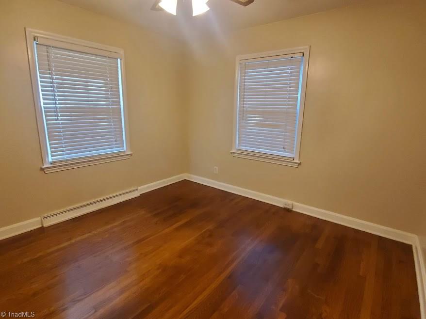 2207 Lane Road Greensboro, NC 27408 - Photo 12 of 19 Both bedrooms 2 and 3 have hardwoods.