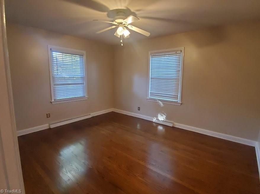 2207 Lane Road Greensboro, NC 27408 - Photo 13 of 19 Another bedroom. There are hardwoods in the hallway as well.