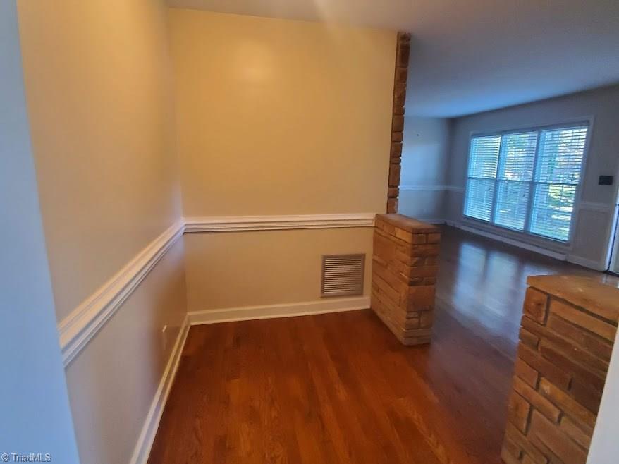 2207 Lane Road Greensboro, NC 27408 - Photo 4 of 19 This space just off the living room would be an ideal home school or computer area. Great flexibility with this space.