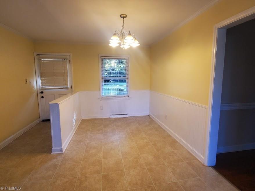 2207 Lane Road Greensboro, NC 27408 - Photo 5 of 19 This is a breakfast/dining area that is just off the deck and overlooks the large backyard.