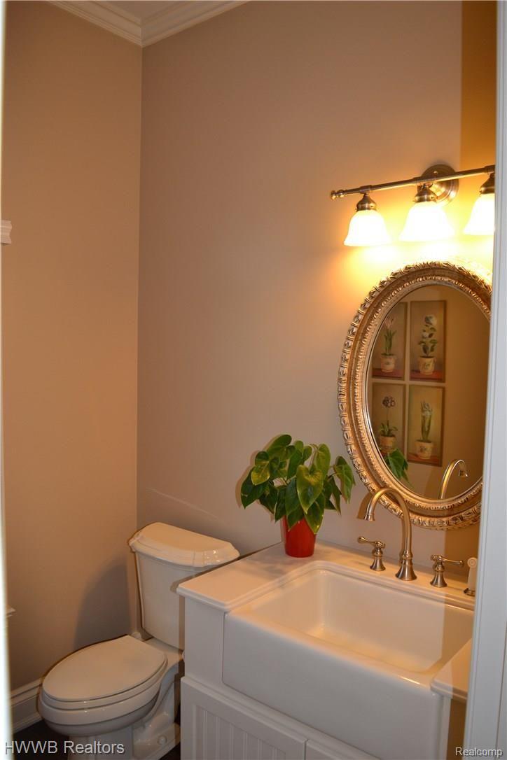 2693 Heights View Court Rochester, MI 48306 - Photo 33 of 95 Back Hall Powder Room with Farm Sink