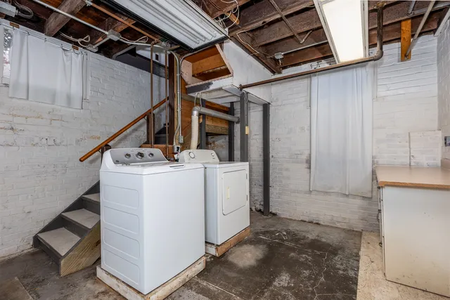 a room with table and chairs