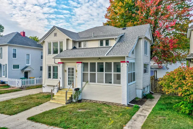 a large room with a large window and a table in the room