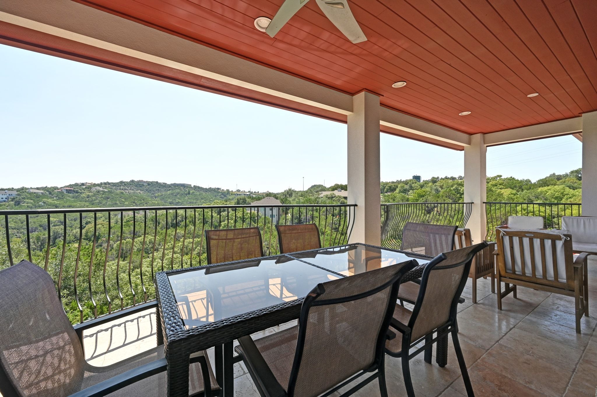 405 Barrett Lane Austin, TX 78733 - Photo 15 of 35 a view of a patio with furniture and a lake view