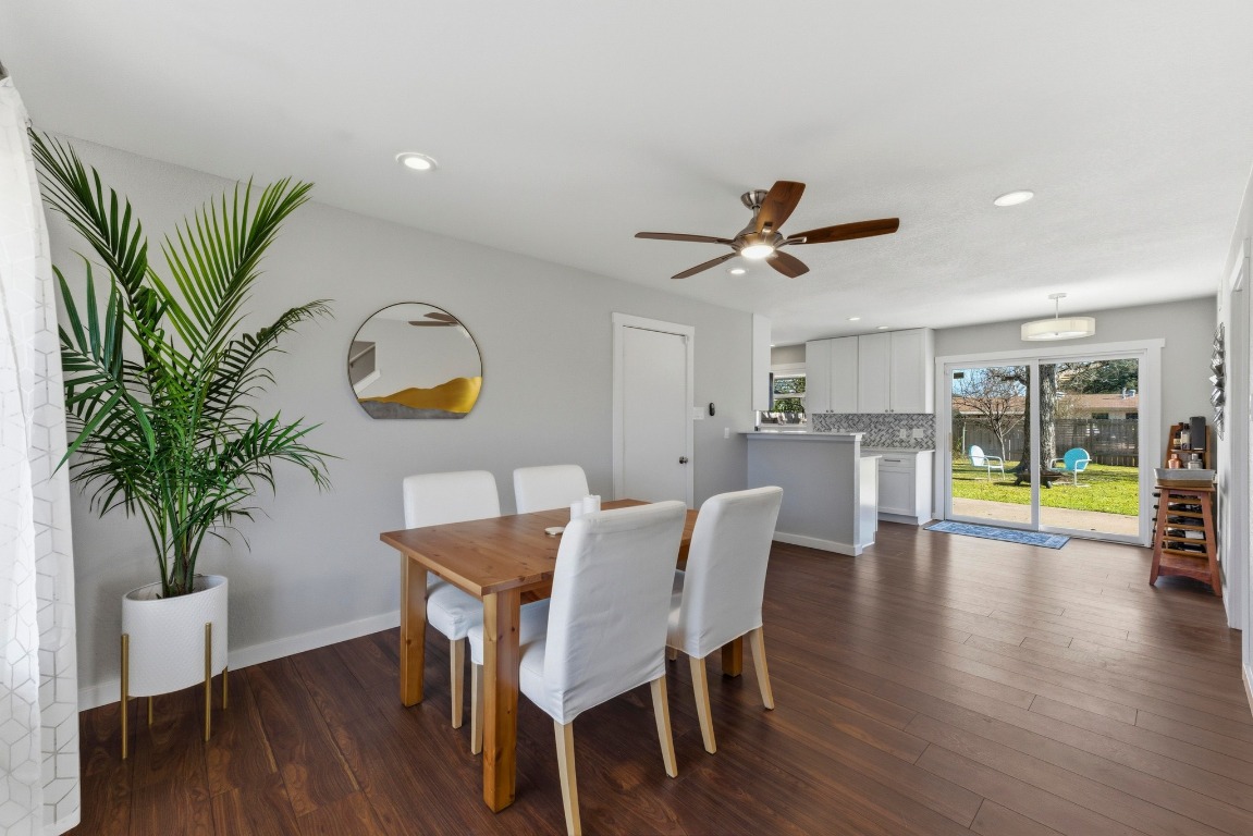 1801 Ohlen Road Austin, TX 78757 - Photo 7 of 29 a view of a dining room with furniture and a potted plant