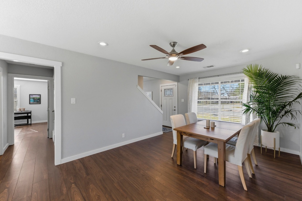 1801 Ohlen Road Austin, TX 78757 - Photo 8 of 29 a view of a dining room with furniture window and wooden floor