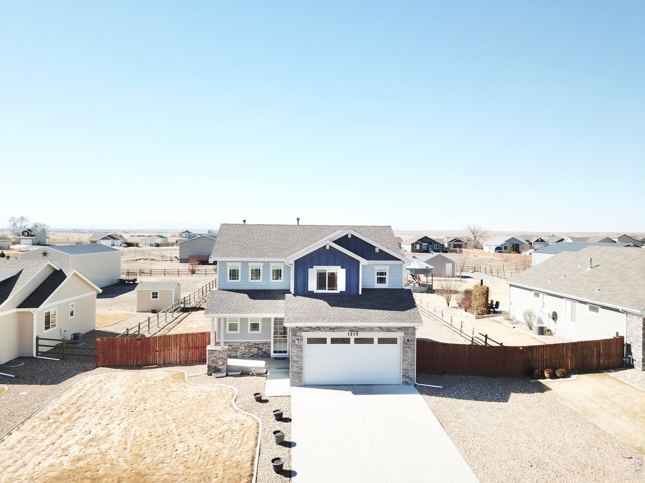 1215 5th Street Pierce, CO 80650 - Photo 22 of 22 a view of a terrace with a bench