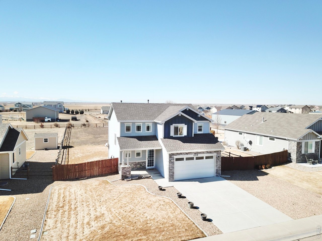 1215 5th Street Pierce, CO 80650 - Photo 3 of 22 an outdoor space with houses