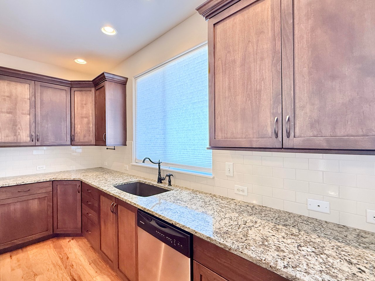 1215 5th Street Pierce, CO 80650 - Photo 6 of 22 a kitchen with a sink cabinets and window