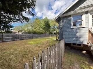 a view of a backyard with a small pool