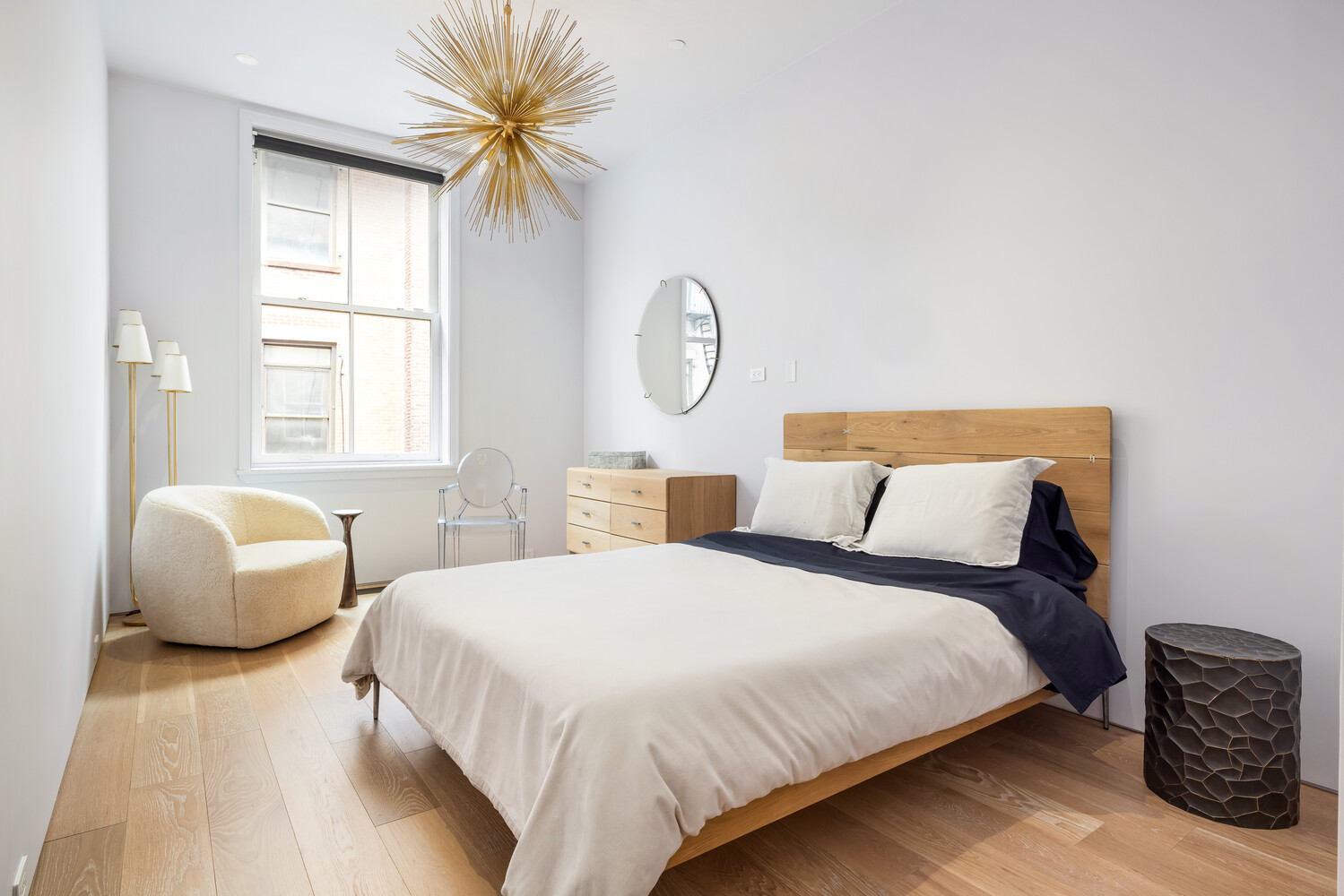 25 Mercer Street, Unit PH Manhattan, NY 10013 - Photo 17 of 20 a bedroom with a bed and window