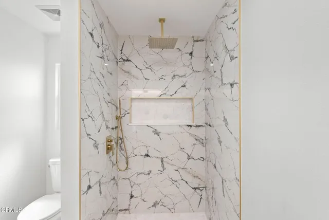 a bathroom with a shower curtain