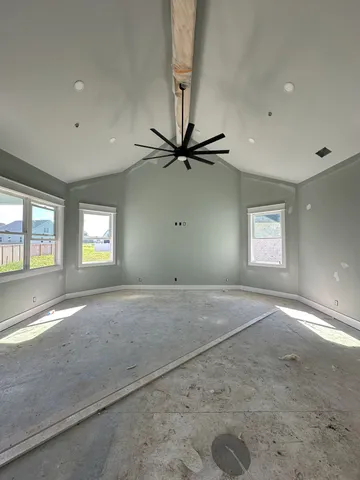 a view of an empty room with a window