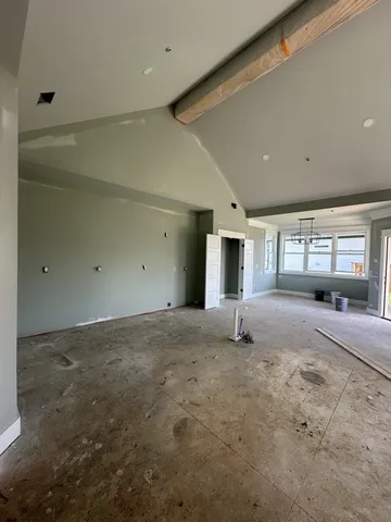 a view of a livingroom with a large window
