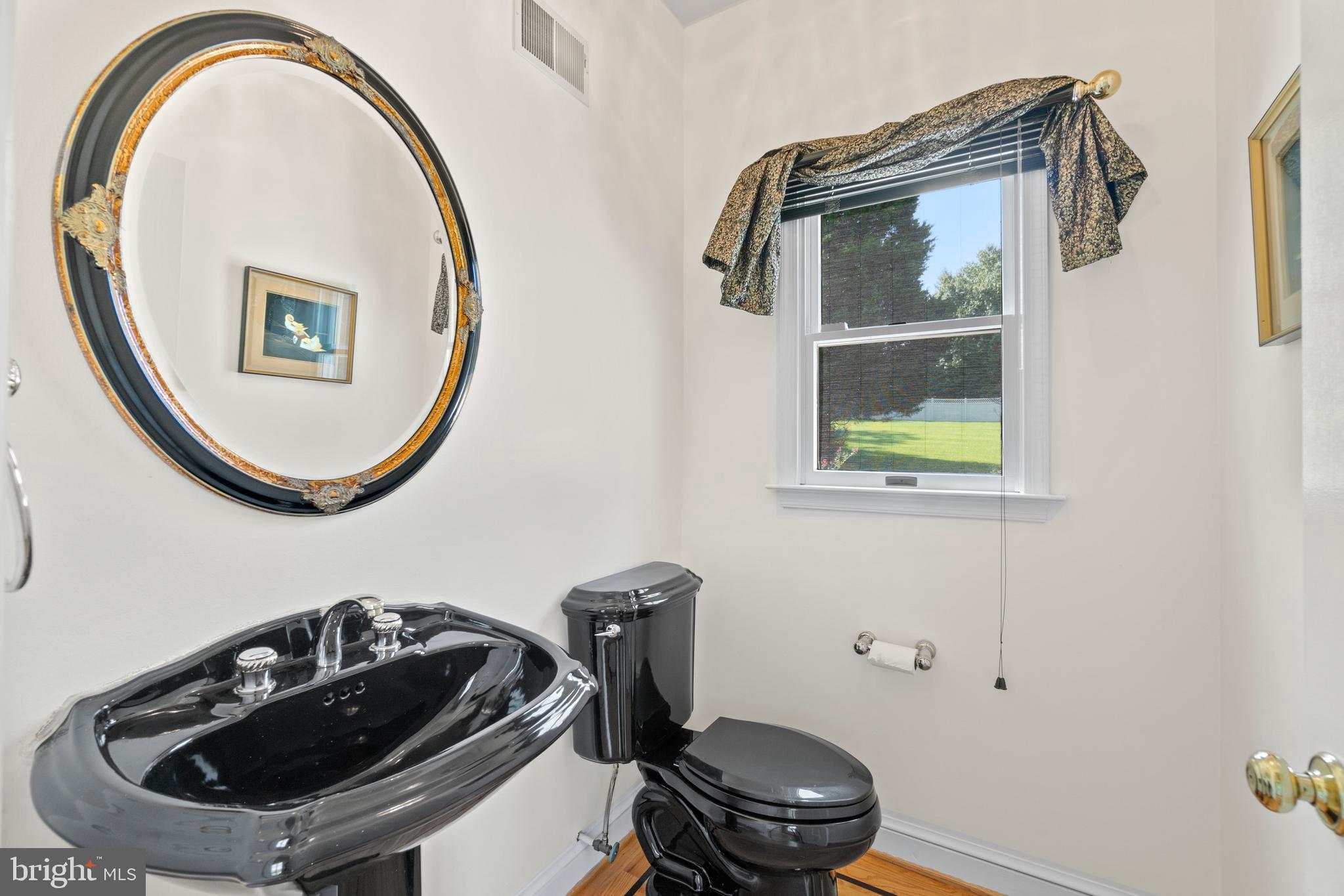 11024 Chandler Road Potomac, MD 20854 - Photo 21 of 44 1st floor powder room
