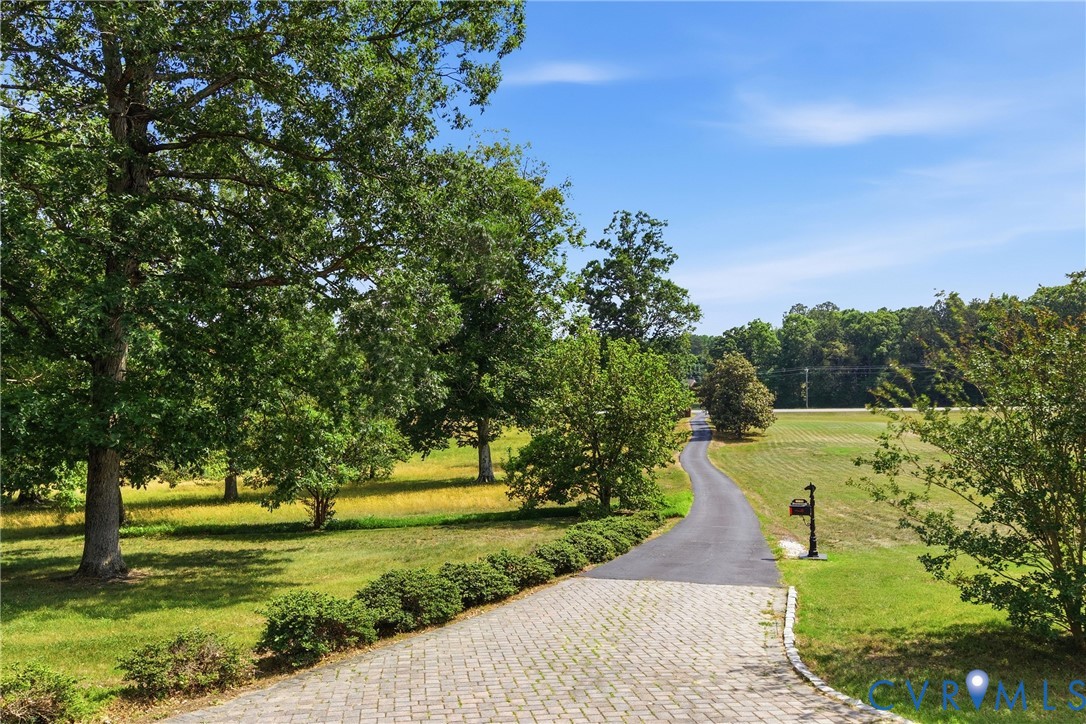 13300 West Patrick Henry Road Doswell, VA 23047 - Photo 68 of 69 Stone paver drive featuring a paved driveway, expa