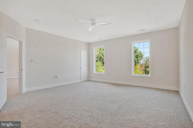 an empty room with windows