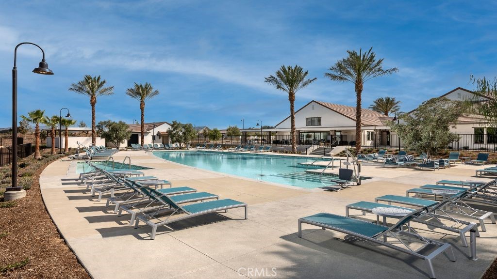 32084 Hyacinth Way Temecula, CA 92591 - Photo 18 of 21 a swimming pool with outdoor seating and yard