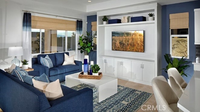 32084 Hyacinth Way Temecula, CA 92591 - Photo 5 of 21 a living room with furniture and a fireplace