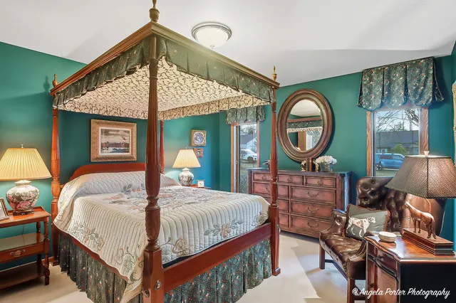 a dining room with furniture and window