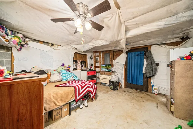 a bed room with a bed and a bed