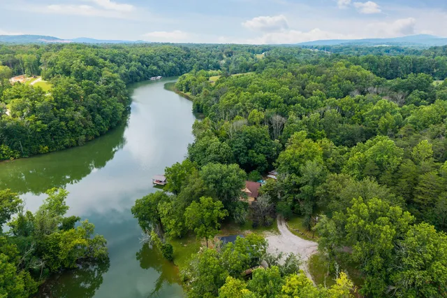 a view of a lake with a house