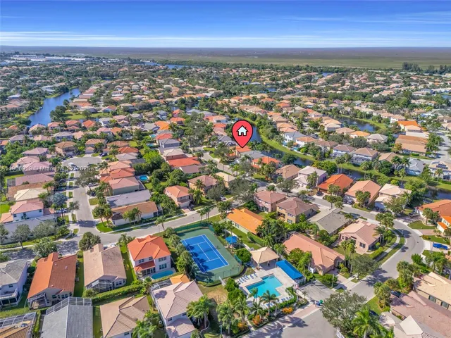 an aerial view of residential building and city