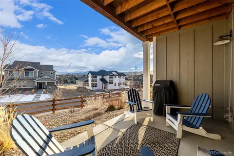 a view of balcony with furniture
