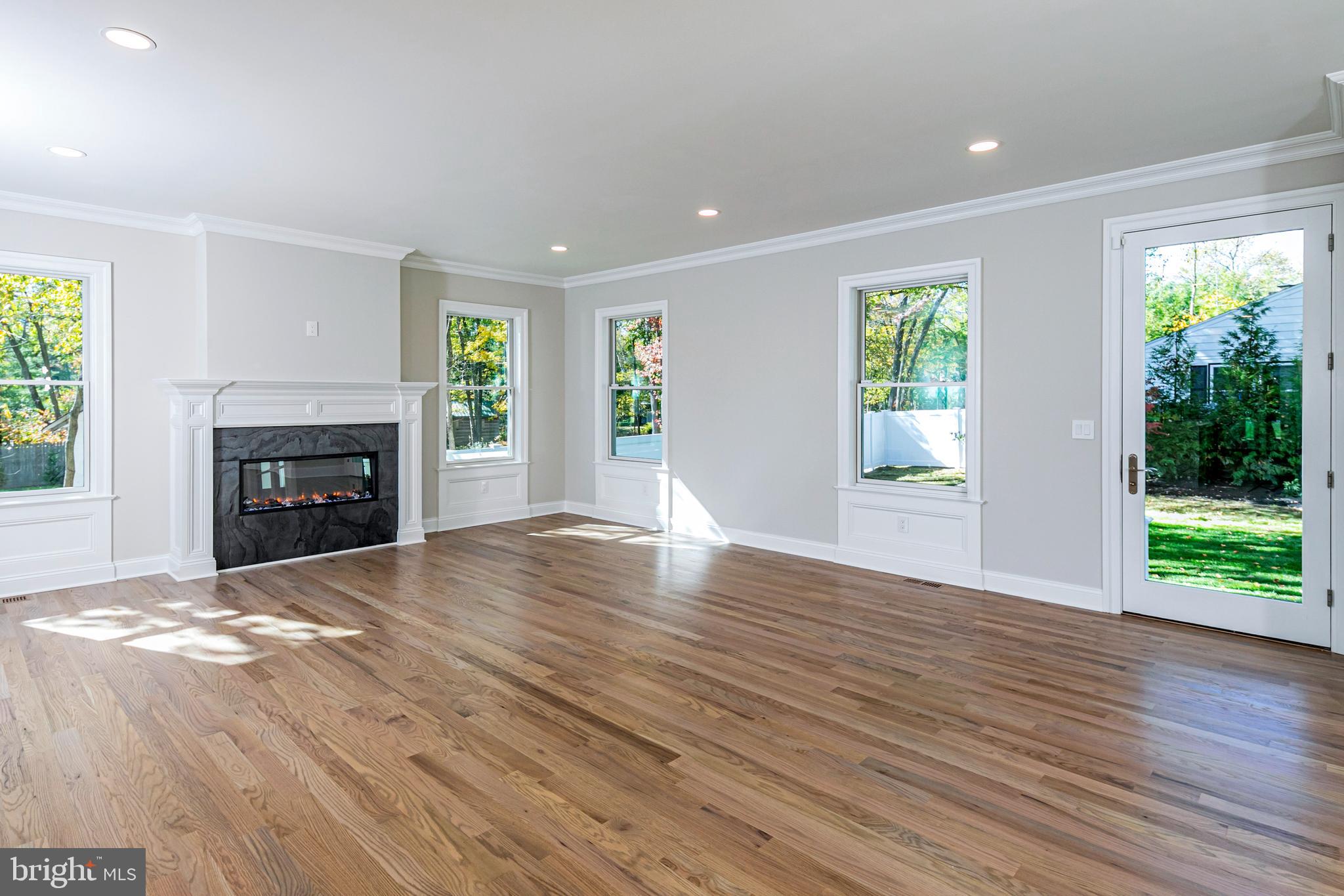 576 Ewing Street Princeton, NJ 08540 - Photo 22 of 61 a view of an empty room with a window and fireplace
