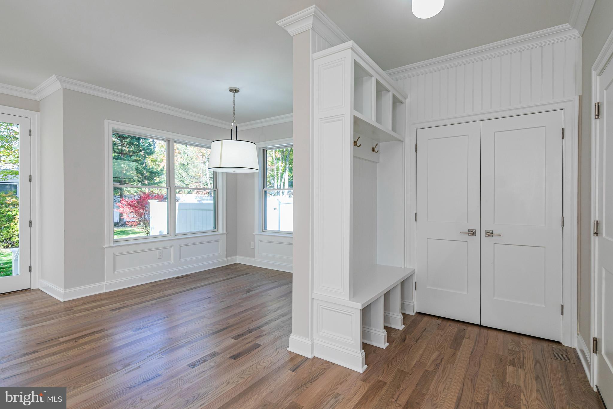 576 Ewing Street Princeton, NJ 08540 - Photo 23 of 61 an empty room with wooden floor fan and windows