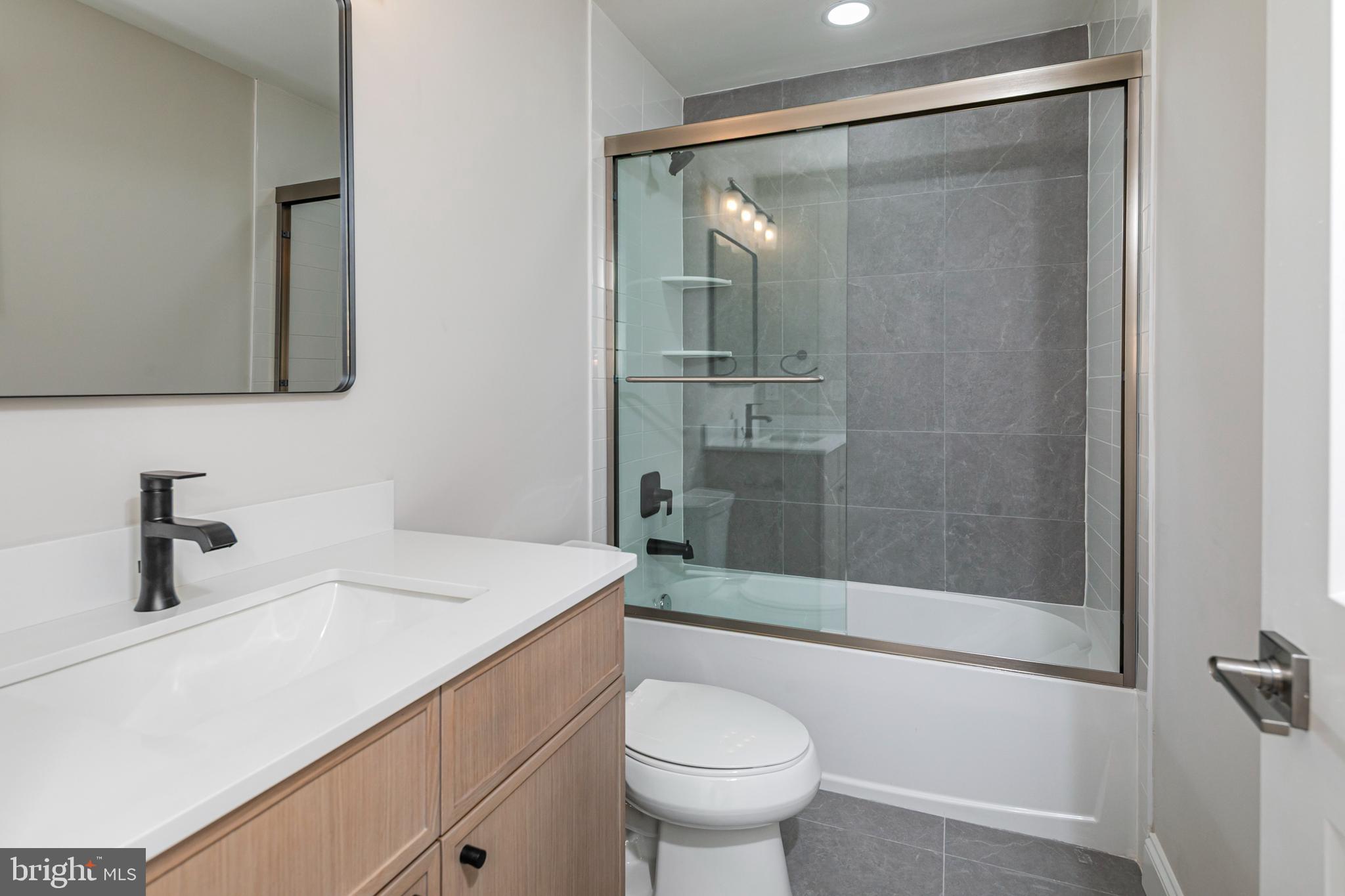 576 Ewing Street Princeton, NJ 08540 - Photo 41 of 61 a bathroom with a sink a toilet and shower