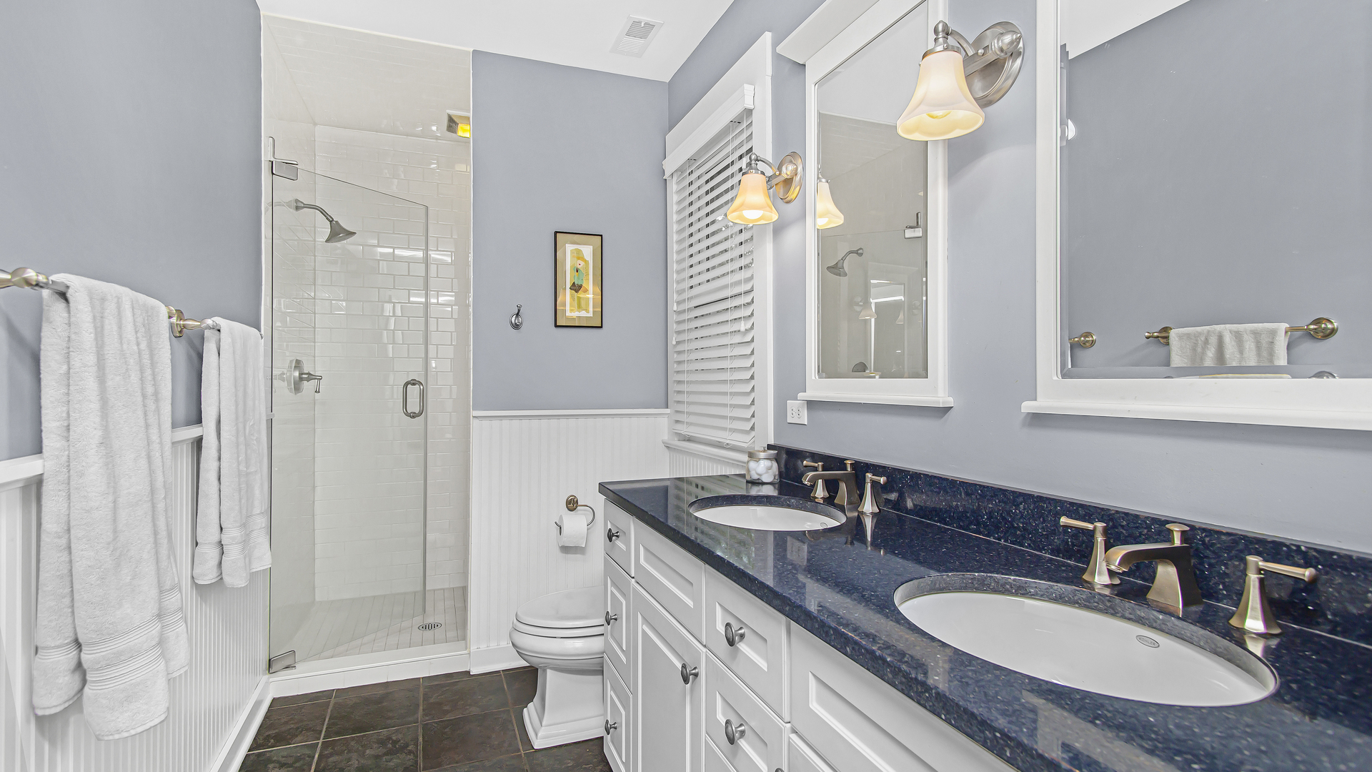 Undisclosed Address Evanston, IL 60201 - Photo 13 of 30 a bathroom with a granite countertop tub sink and mirror