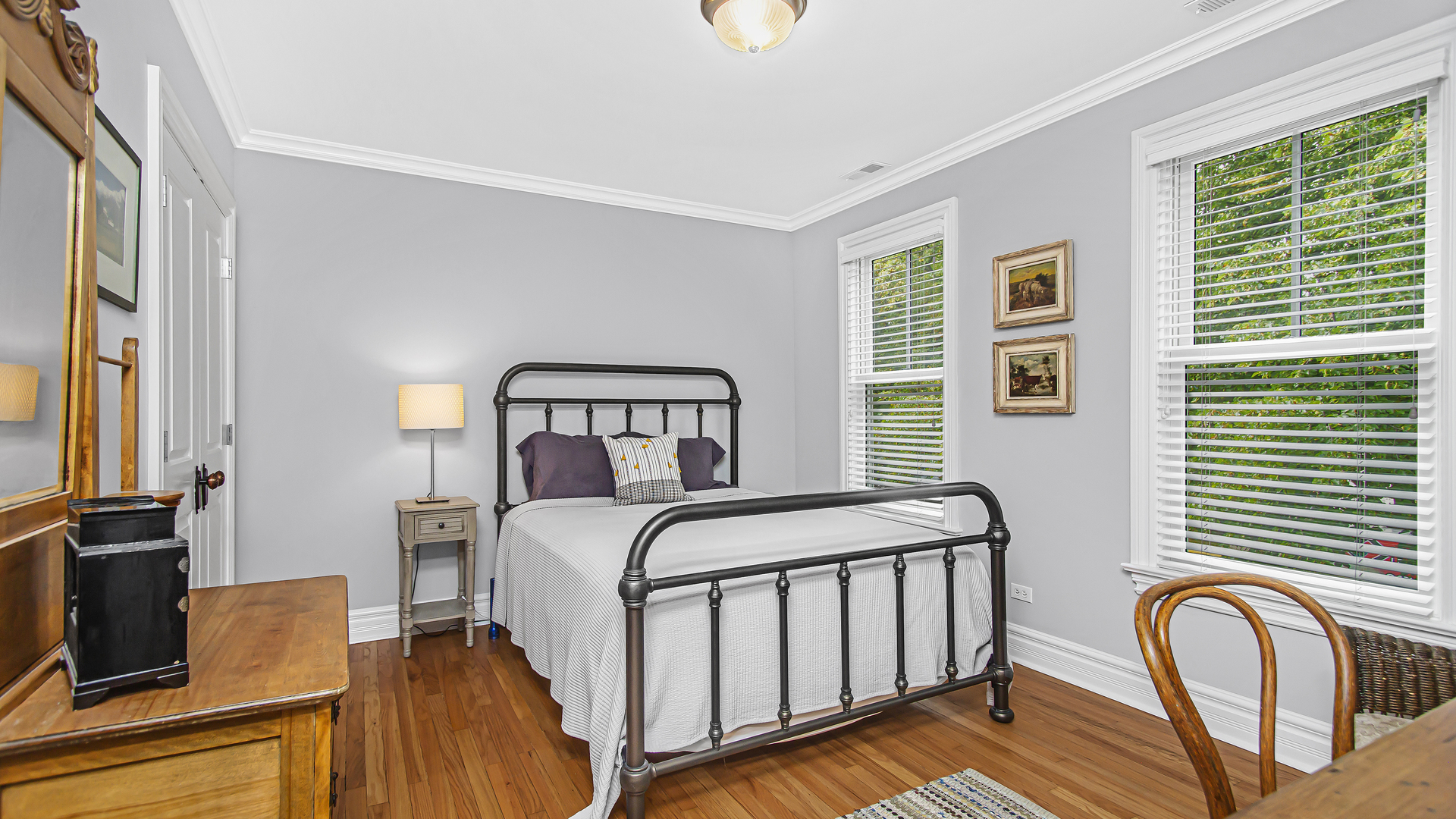 Undisclosed Address Evanston, IL 60201 - Photo 14 of 30 a bedroom with a bed and a window